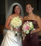 roses, freezia , stargazer lilies and roses make this lovely Bridesmaid bouquet.  great florist and bridal planner.