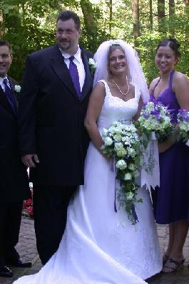 wedding florist made cascade wedding bouquet from roses , gardenias and stephanotis