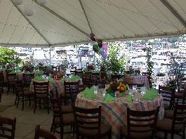 long shot of tent showing many tables and centerpieces..."packages"