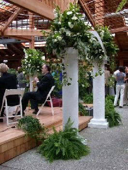 four outstanding column bouquets create the alter.